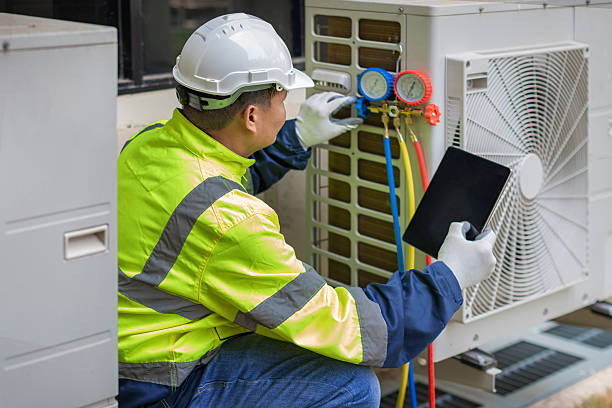 Professional Hvac technician working in Mackinaw, IL